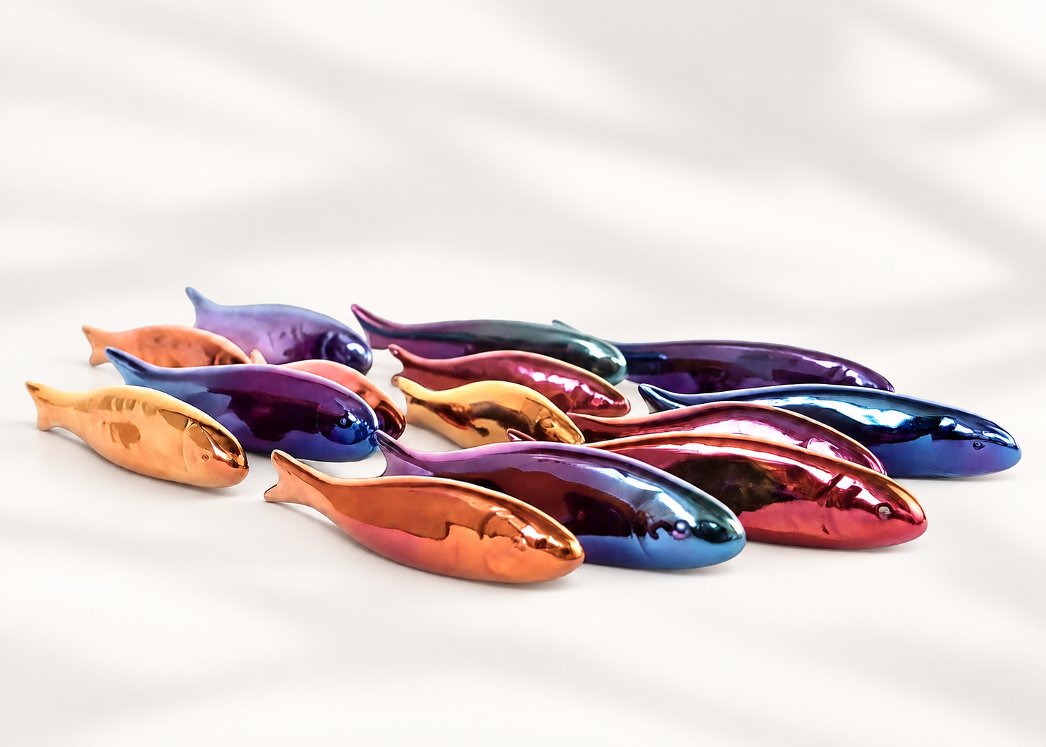 Colourful metallic ceramic fish collection