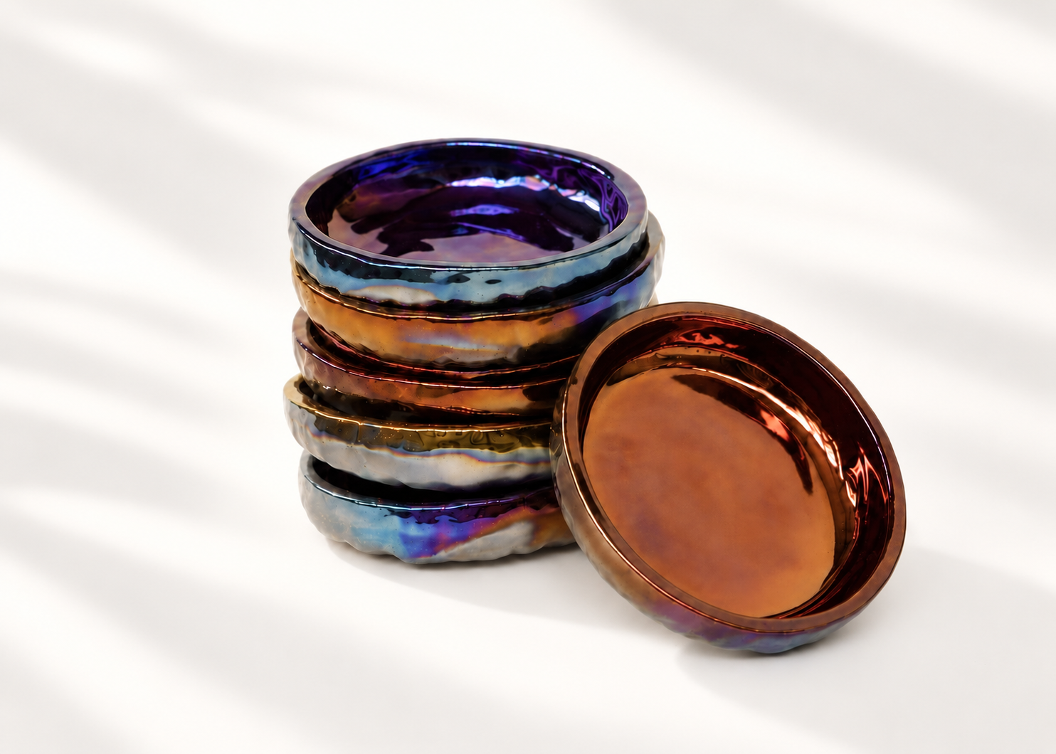 Stacked metallic lustre ceramic dishes